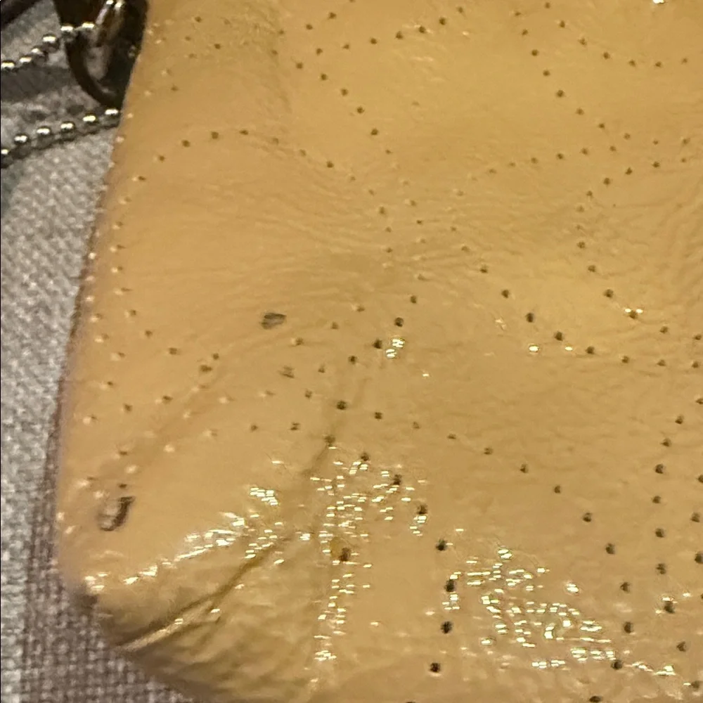Coach Perforated Signature Gold Leather Wristlet